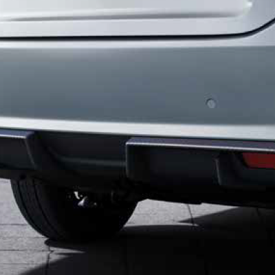 A sporty carbon-wrapped rear bumper diffuser